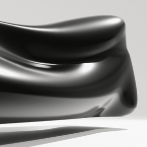 Forme aérodynamique lisse utilisée pour tester la finition de surface ou les couleurs dans le design industriel. La surface est incurvée, avec des lignes fluides et épurées, souvent utilisée pour simuler les contours d'un véhicule ou d'un produit.